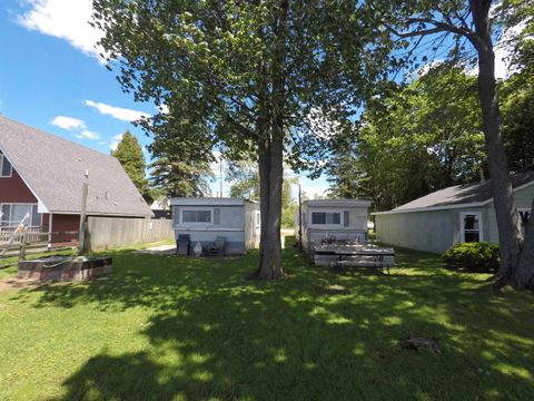 Photo of 661 E Lake Mitchell Drive, Cherry Grove Township, MI 49601 (MLS # 78080069933)