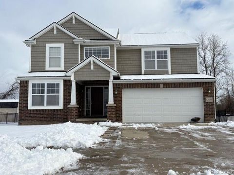 Photo of 52658 Delena Drive, Macomb Township, MI 48042 (MLS # 20251060867)