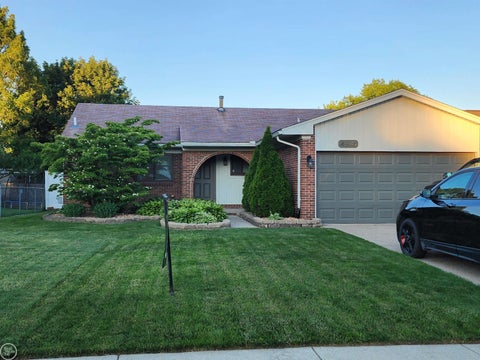 Photo of 45540 Heatherwoode Lane, Macomb Township, MI 48044 (MLS # 58050212831)