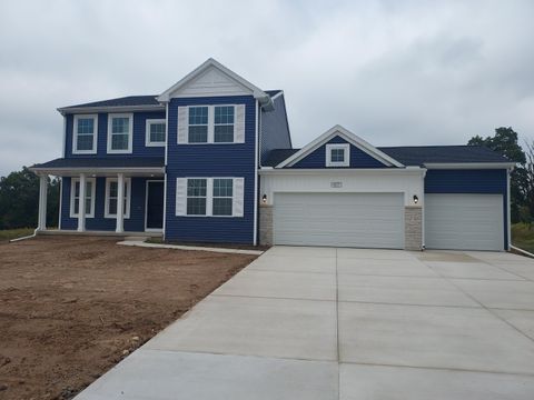 Photo of 9577 Snow Valley Drive SE, Caledonia Township, MI 49302 (MLS # 65025057220)