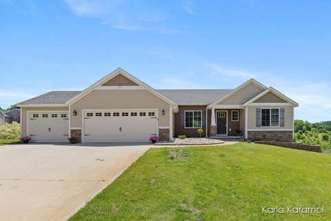 Photo of 11782 Ridge Water Drive NE, Algoma Township, MI 49345 (MLS # 65026031737)