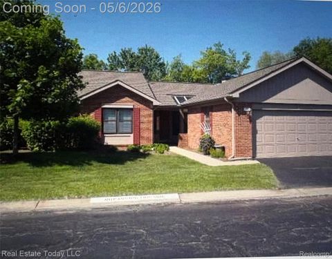 Photo of 7283 Huntcliff #57, West Bloomfield Charter Township, MI 48322 (MLS # 20261029792)
