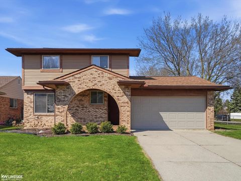 Photo of 45833 Heatherwoode Lane, Macomb Township, MI 48044 (MLS # 58050205856)