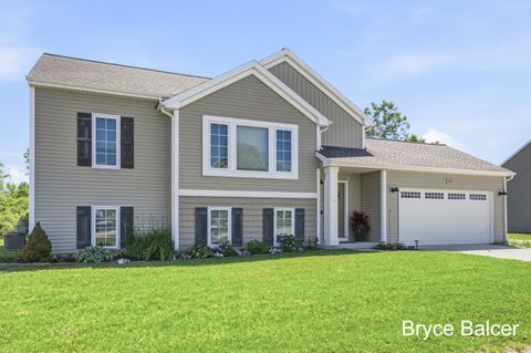 Photo of 338 Vansen Drive, Kent City Village, MI 49330 (MLS # 65026030523)