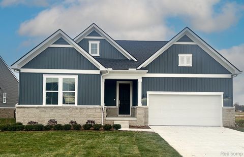 Photo of 50681 Crusader Drive, Macomb Township, MI 48042 (MLS # 20251061281)