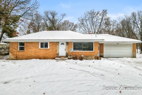 Photo of 609 SE 60th Street SE, Kentwood City, MI 49548 (MLS # 65025061829)