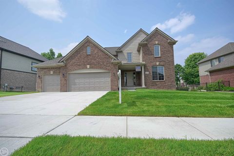 Photo of 22119 Sturgeon River Drive, Macomb Township, MI 48044 (MLS # 58050187304)