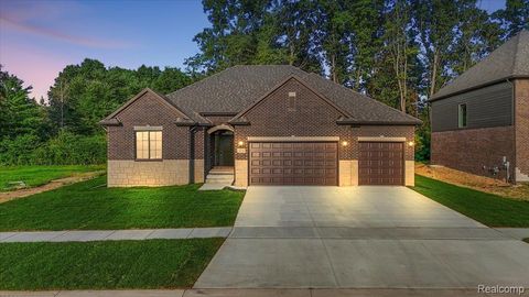 Photo of 50798 Mistwood Drive, Macomb Township, MI 48042 (MLS # 20251012222)