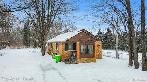 Photo of 45945 N GRATIOT Avenue, Macomb Township, MI 48042 (MLS # 20251043567)