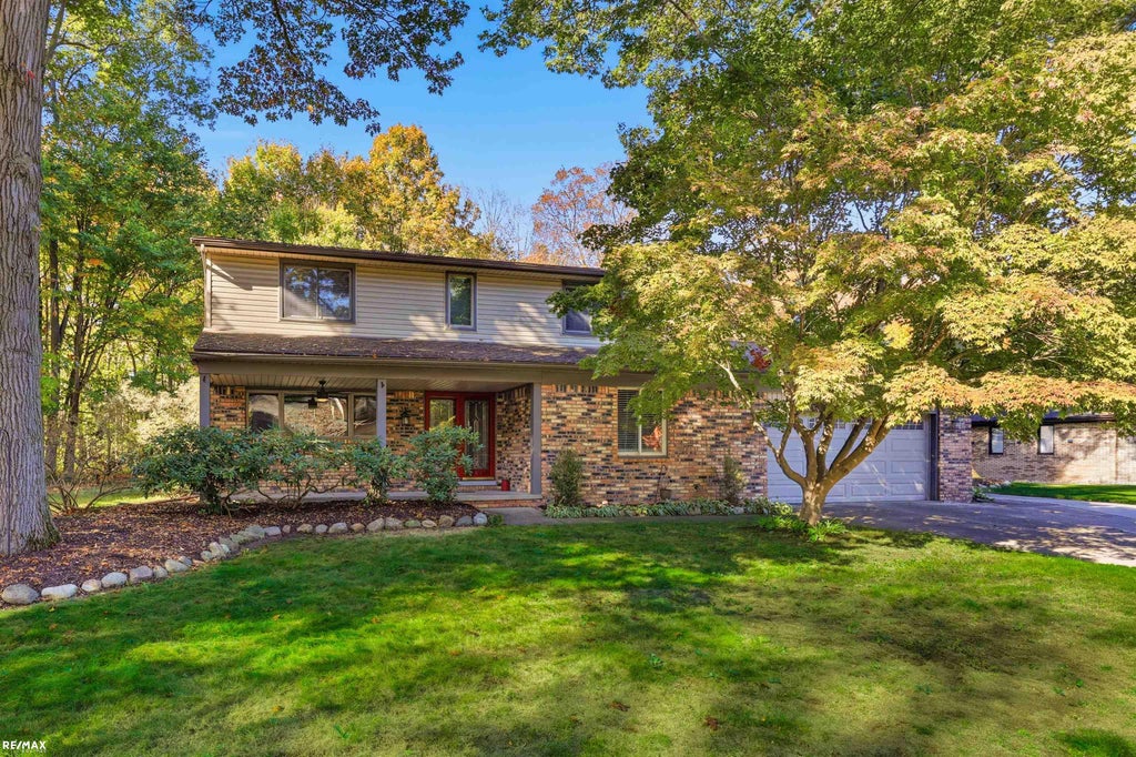 Photo of 12894 Parkridge Drive, Shelby Charter Township, MI 48315 (MLS # 58050225493)