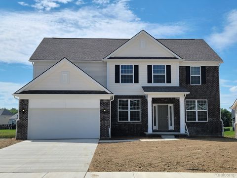 Photo of 51261 Deerbrook Drive, Macomb Township, MI 48042 (MLS # 20251047582)