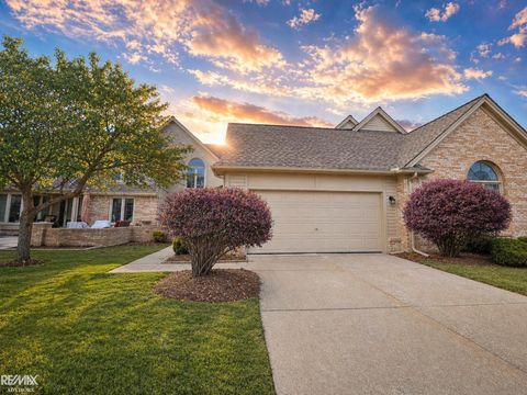 Photo of 16890 SANDSTONE Circle, Macomb Township, MI 48042 (MLS # 58050205930)