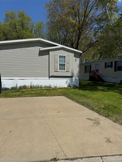 Photo of 1414 Nardeer St., Novi City, MI 48374 (MLS # 20261033010)