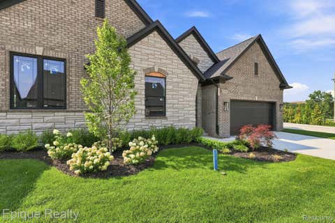 Photo of 3301 Cornerstone Drive #73, Orion Charter Township, MI 48360 (MLS # 20261064620)