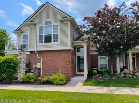 Photo of 28209 Oakmonte Circle E, Lyon Charter Township, MI 48165 (MLS # 20261033850)