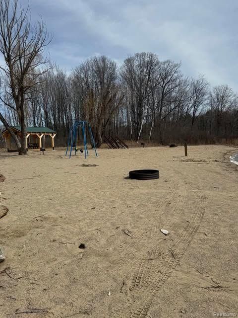 Tiny photo for 5892 WOODLAND Drive, Surrey Township, MI 48632 (MLS # 20261038784)