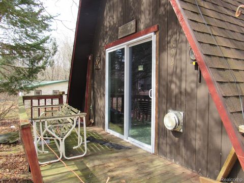 Tiny photo for 5892 WOODLAND Drive, Surrey Township, MI 48632 (MLS # 20261038784)