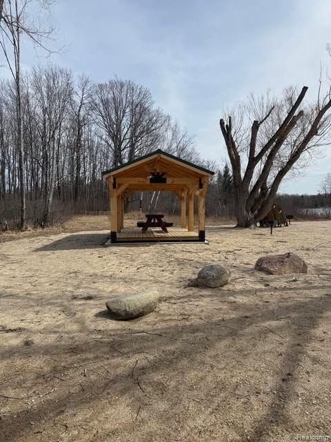Tiny photo for 5892 WOODLAND Drive, Surrey Township, MI 48632 (MLS # 20261038784)