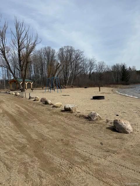 Tiny photo for 5892 WOODLAND Drive, Surrey Township, MI 48632 (MLS # 20261038784)
