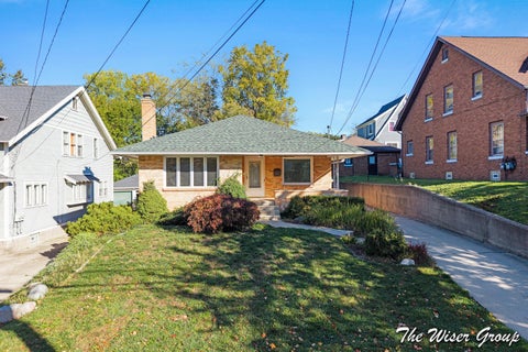 Photo of 1105 4th Street NW, Grand Rapids City, MI 49504 (MLS # 65026055976)
