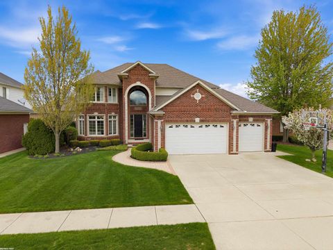 Photo of 16465 Bishopsgate Drive, Macomb Township, MI 48044 (MLS # 58050206051)