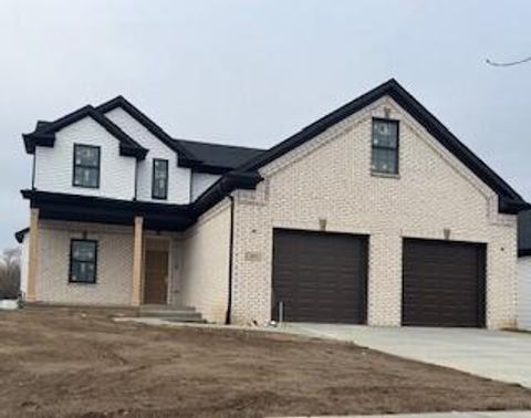 Photo of 301 White Owl Lane #236, Dundee Village, MI 48131 (MLS # 81026013521)