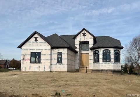 Photo of 6489 POND Dr, Washington Township, MI 48094 (MLS # 20251053013)