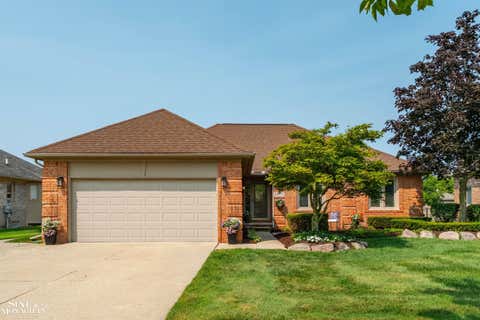 Photo of 54375 Jeffery Drive, Macomb Township, MI 48042 (MLS # 58050218154)
