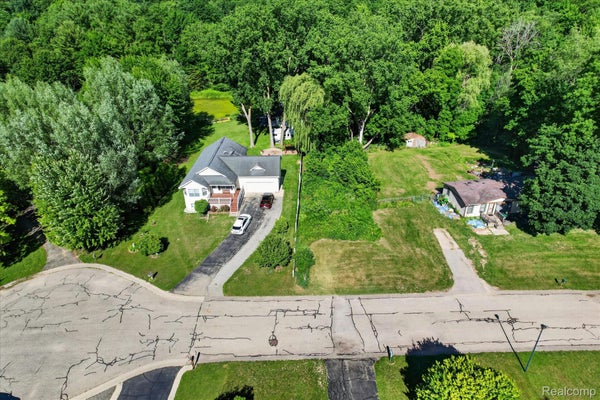 4975 PLEASANT CREEK AVE NE, COMSTOCK PARK, MI 49321 - Image b32080b8300c0b66c8d2abd20df74e8f/672409055