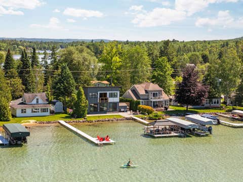 Photo of 7586 Crystal Beach Road, Clearwater Township, MI 49676 (MLS # 78080069920)