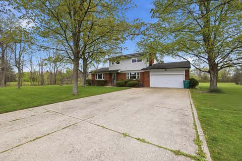 Photo of 46700 Tilch Road, Macomb Township, MI 48044 (MLS # 58050207443)