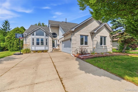 Photo of 52279 Matterhorn Drive, Macomb Township, MI 48042 (MLS # 20261054575)