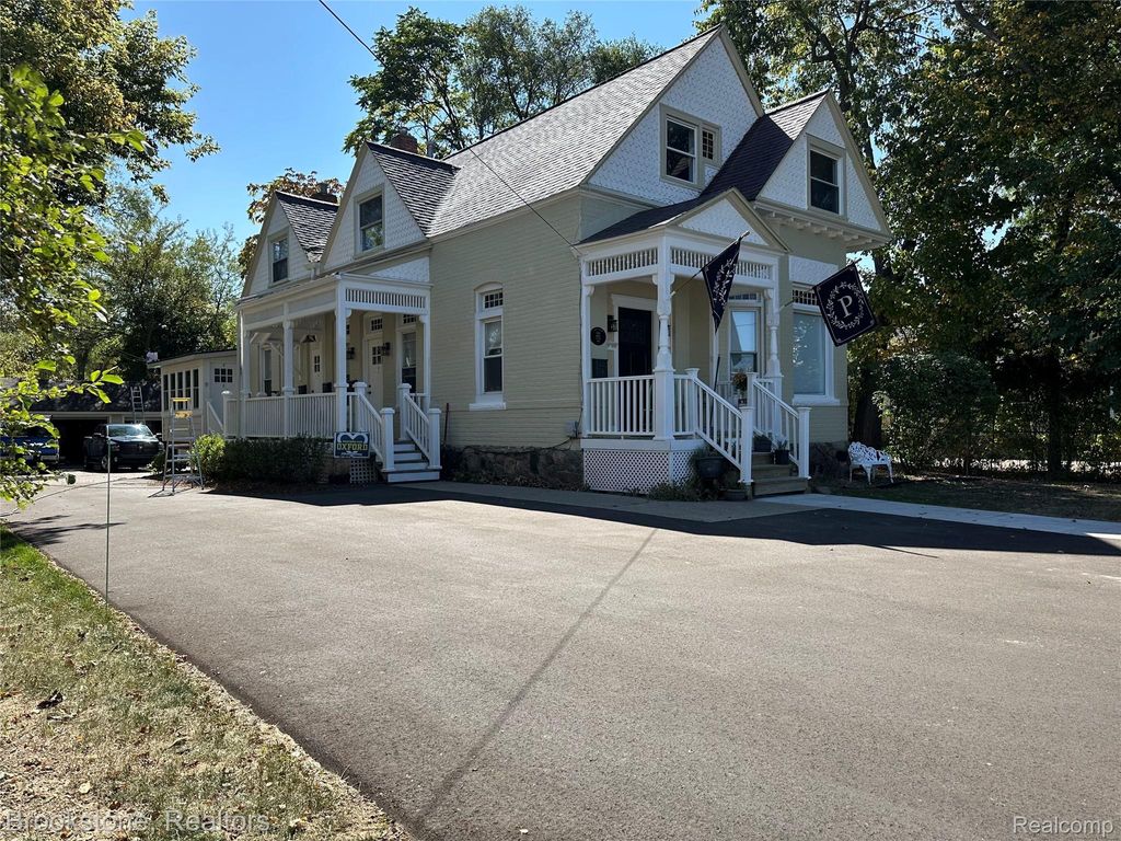 Photo of 14 W Burdick Street #1, Oxford Village, MI 48359 (MLS # 20261027354)