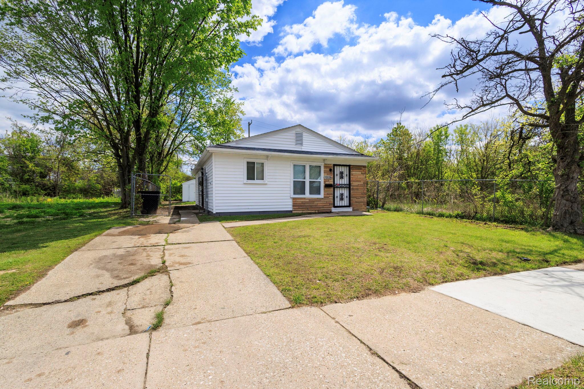 View of front of home featuring driveway