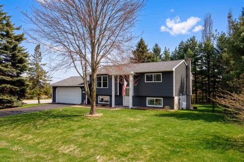 Photo of 4005 Hearthside Drive, Garfield Charter Township, MI 49684 (MLS # 78080067603)