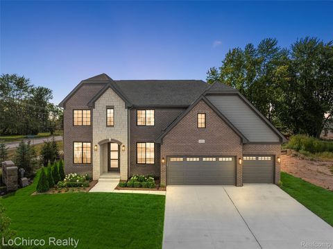 Photo of 49001 Wingfield Drive, Macomb Township, MI 48044 (MLS # 20261030187)