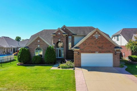 Photo of 15892 Hyacinth Drive, Macomb Township, MI 48042 (MLS # 58050191019)