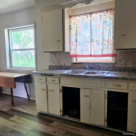 Tiny photo for 629 Spencer Street, Flint City, MI 48505 (MLS # 20261069415)