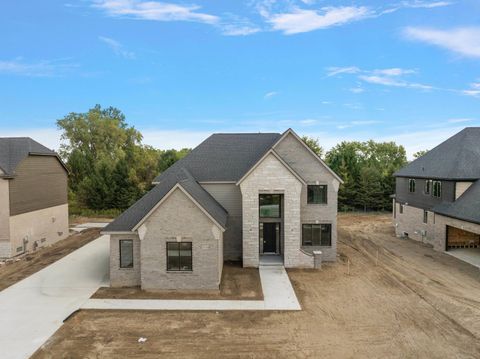 Photo of 57116 Veridian Drive, Washington Township, MI 48094 (MLS # 58050190435)