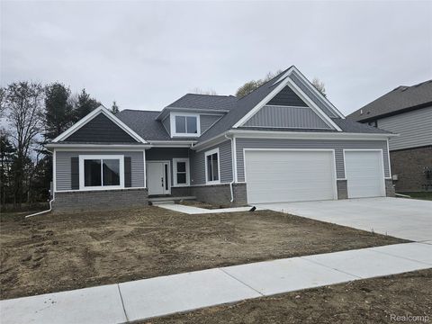 Photo of 49287 London Bridge Drive, Macomb Township, MI 48044 (MLS # 20251057822)