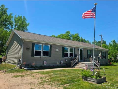 Photo of 20 E Mier Road, Lincoln Township, MI 48657 (MLS # 61050211994)