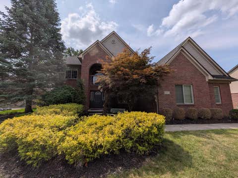 Photo of 46815 Grand Oak Court, Canton Charter Township, MI 48187 (MLS # 81026038409)