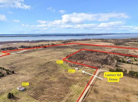 Photo of 7710 US-31 N, Acme Township, MI 49690 (MLS # 78080067520)