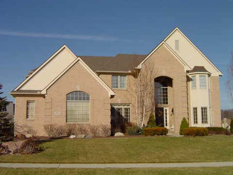 Photo of 8895 Woodlore South Drive, Plymouth Charter Township, MI 48170 (MLS # 81026040928)