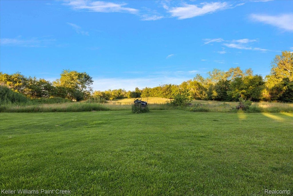 Photo of 54230 Card Rd, Macomb Township, MI 48042 (MLS # 20261083620)