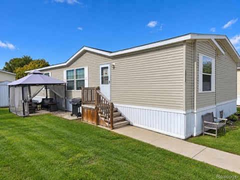 Photo of 46425 Le Grande Boulevard, Macomb Township, MI 48044 (MLS # 20261081352)