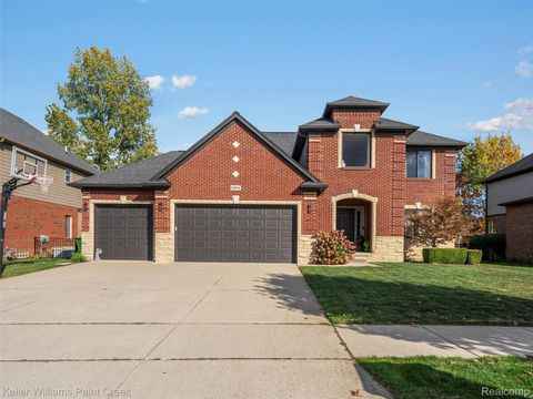 Photo of 55614 Estates Lane, Macomb Township, MI 48042 (MLS # 20251044464)