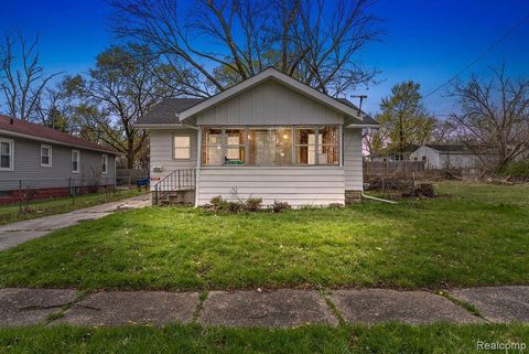 Photo of 1717 WOLCOTT Street, Flint City, MI 48504 (MLS # 20261024161)