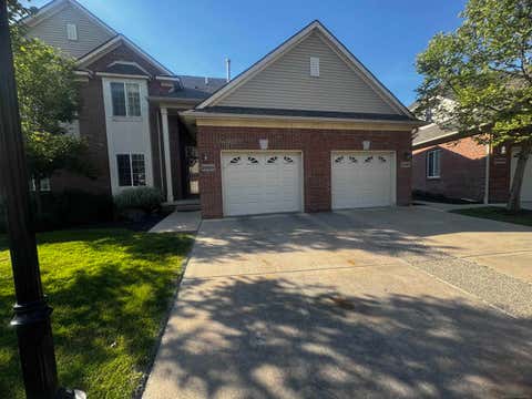 Photo of 29459 Woodpark Circle, Warren City, MI 48092 (MLS # 58050210009)