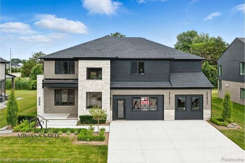 Photo of 50931 MISTWOOD Drive, Macomb Township, MI 48042 (MLS # 20261053551)